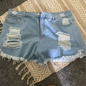 Ripped Blue Jean Shorts